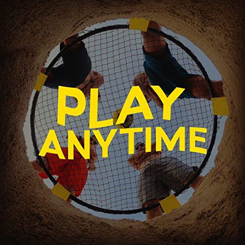 The 6 Best Spikeball Sets - Spikeball Standard set up outdoors with players in the background